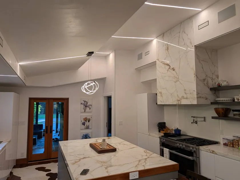 Polished plaster kitchen with linear lighting