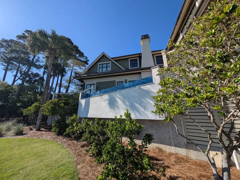Textured stucco wall and glazed tile edge